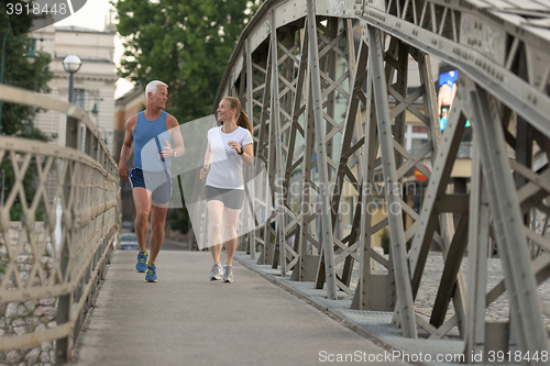 Image of couple jogging