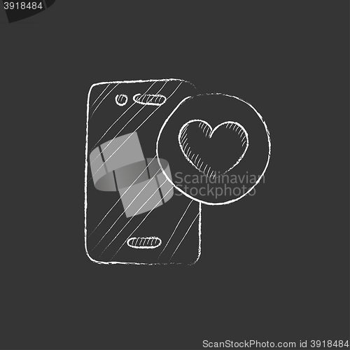 Image of Smartphone with heart sign. Drawn in chalk icon.