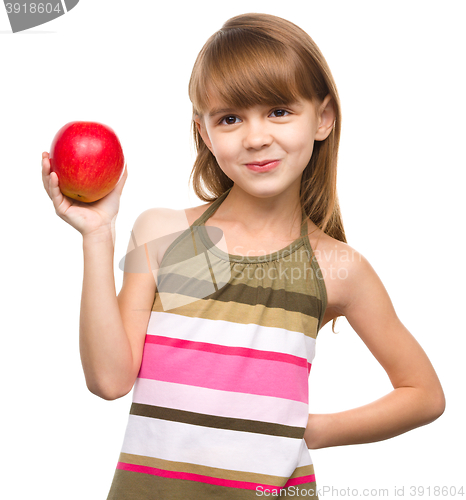Image of Little girl with red apple