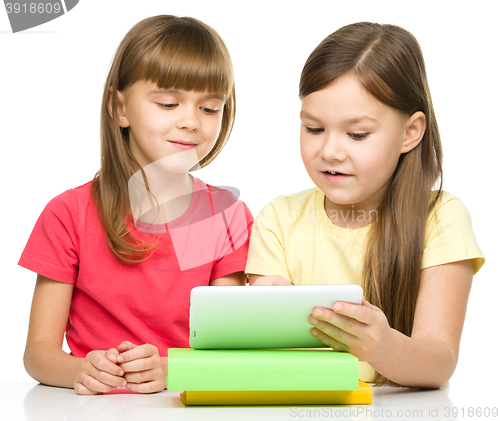 Image of Children are using tablet