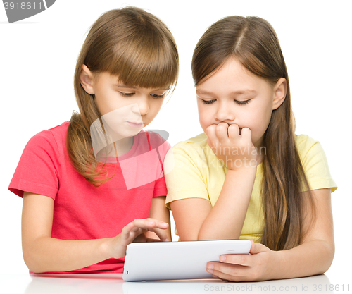 Image of Children are using tablet