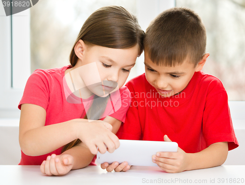 Image of Children are using tablet