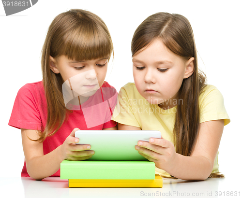 Image of Children are using tablet