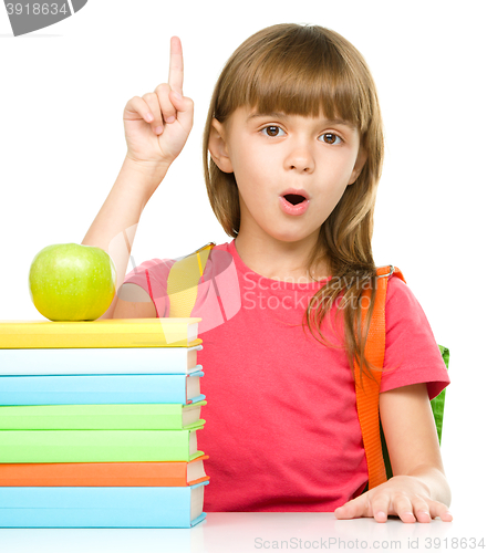 Image of Little girl with her books