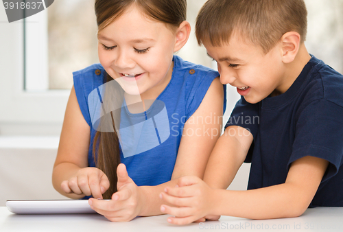 Image of Children are using tablet