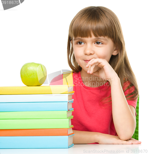 Image of Little girl with her books