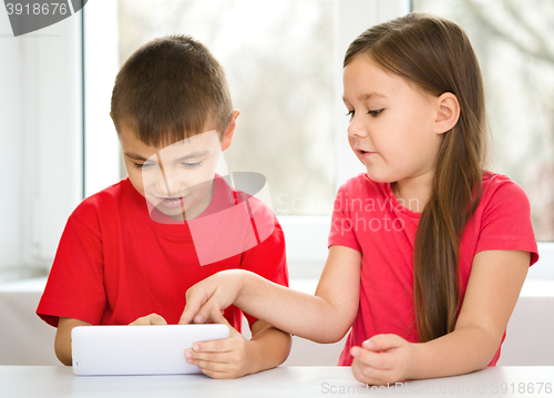 Image of Children are using tablet