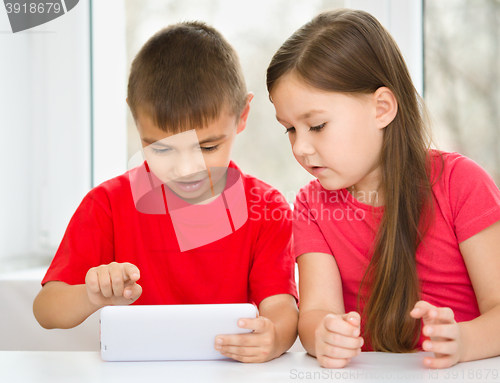 Image of Children are using tablet