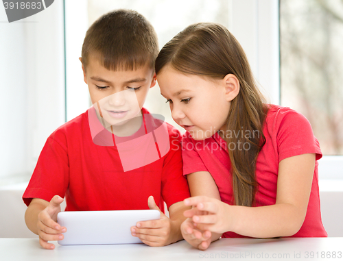 Image of Children are using tablet