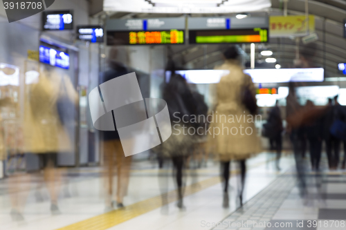 Image of Business people traveling by Tokyo metro.