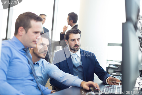 Image of Business team working in corporate office.