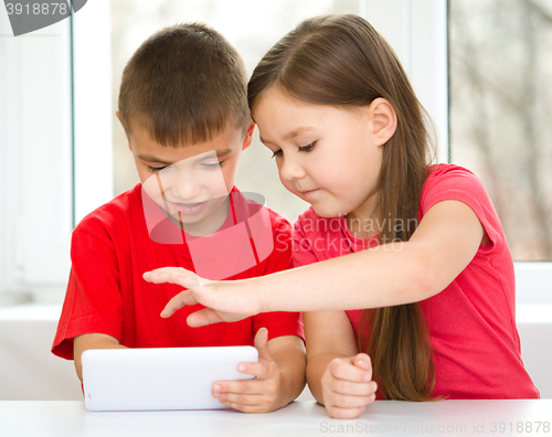 Image of Children are using tablet