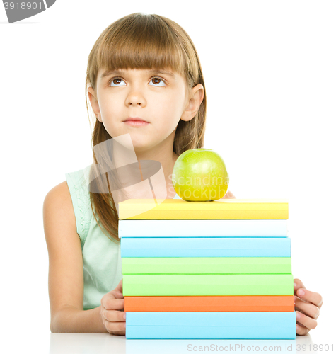 Image of Little girl with her books