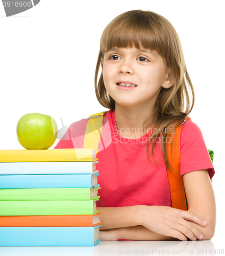 Image of Little girl with her books