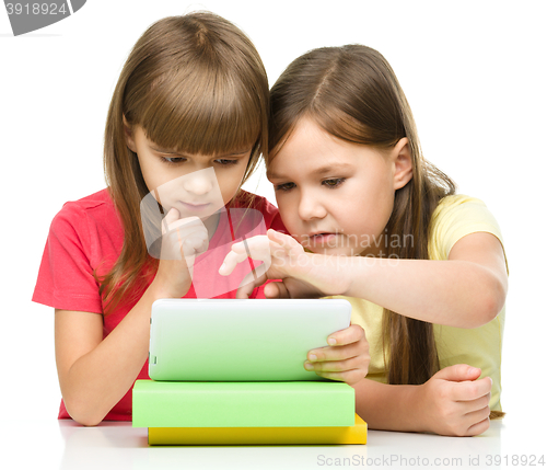 Image of Children are using tablet