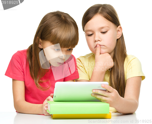 Image of Children are using tablet