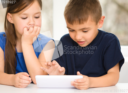 Image of Children are using tablet