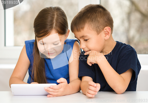 Image of Children are using tablet