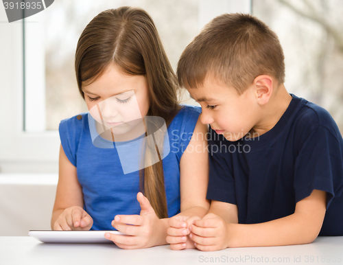 Image of Children are using tablet