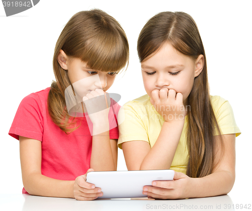 Image of Children are using tablet