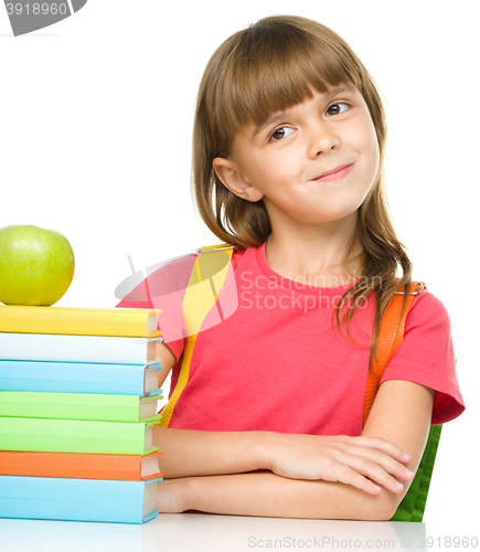 Image of Little girl with her books