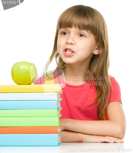 Image of Little girl with her books