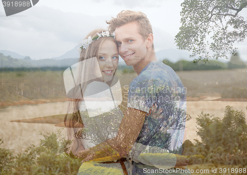 Image of happy smiling young hippie couple outdoors