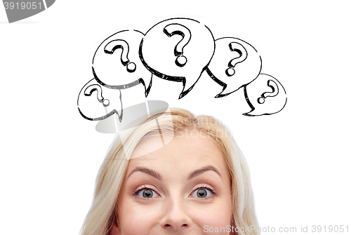 Image of happy young woman head with question marks