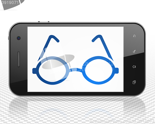 Image of Science concept: Smartphone with Glasses on display