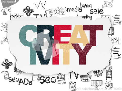 Image of Marketing concept: Creativity on Torn Paper background