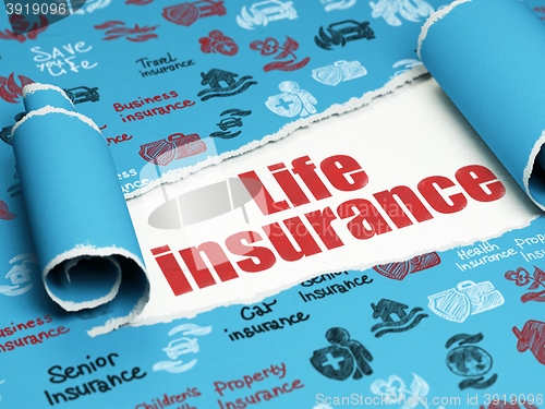 Image of Insurance concept: red text Life Insurance under the piece of  torn paper