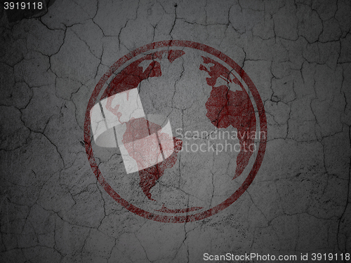 Image of Education concept: Globe on grunge wall background
