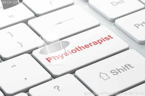 Image of Medicine concept: Physiotherapist on computer keyboard background