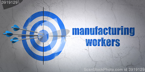 Image of Industry concept: target and Manufacturing Workers on wall background