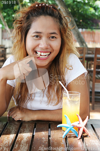 Image of Girl drinking juice