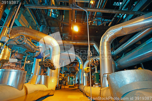 Image of Industrial zone, Steel pipelines, valves, cables and walkways