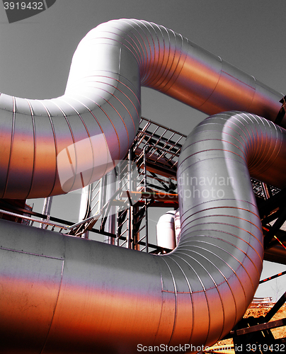 Image of Industrial zone, Steel pipelines at sunset