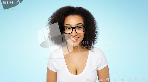 Image of happy african woman or student girl in eyeglasses