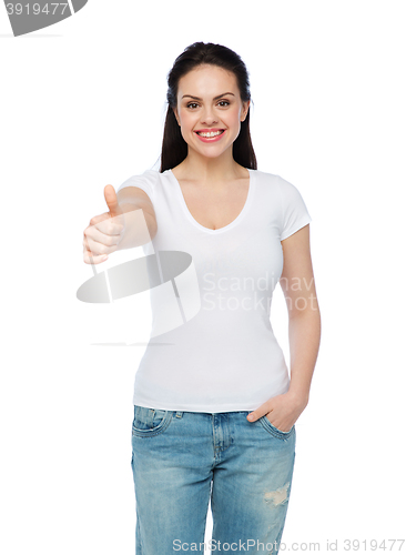 Image of happy womanin white t-shirt showing thumbs up