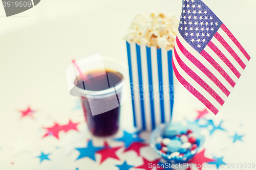 Image of cola and popcorn with candies on independence day