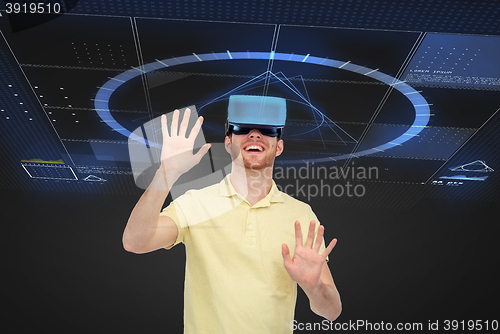 Image of happy man in virtual reality headset or 3d glasses