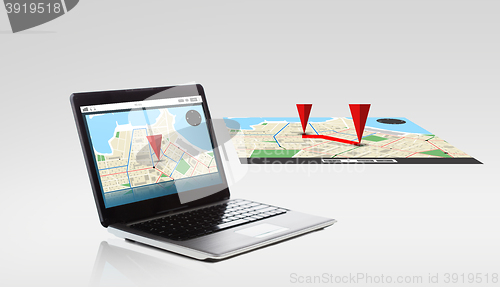 Image of laptop computer with gps navigator map on screen