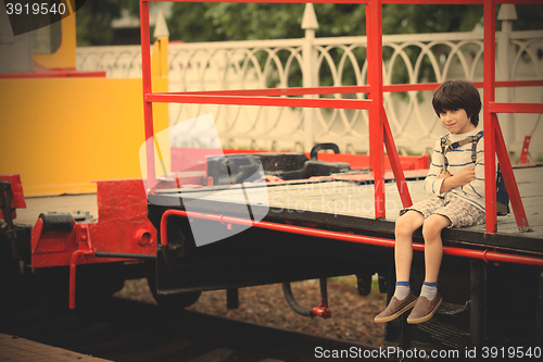 Image of smiling boy with a backpack