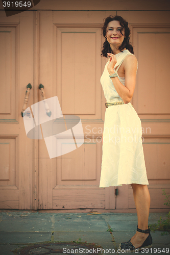 Image of woman in white dress