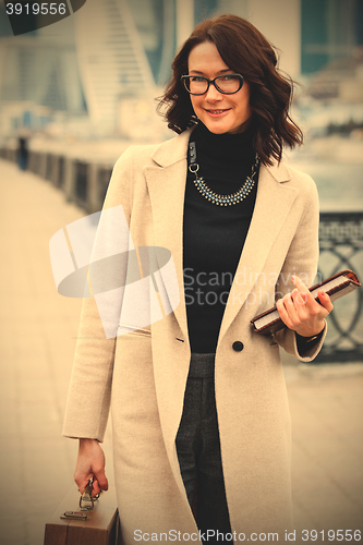 Image of woman in a bright coat