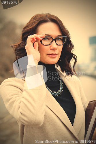 Image of beautiful woman with glasses