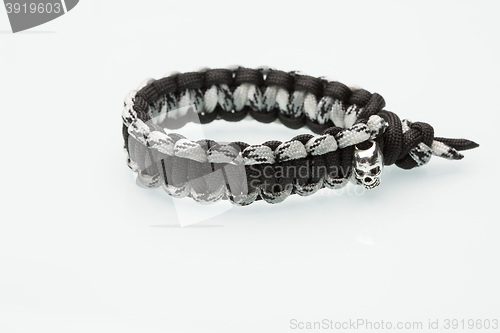 Image of Black braided bracelet on white background