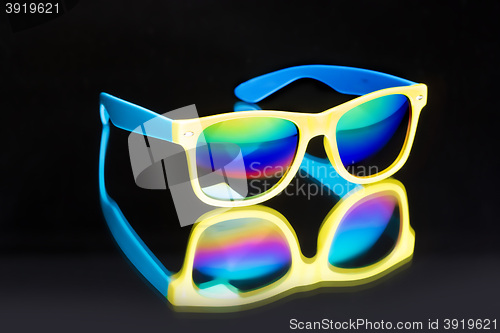Image of colored sunglasses.