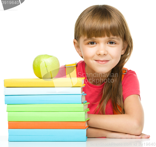 Image of Little girl with her books