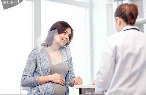 Image of gynecologist doctor and pregnant woman at hospital